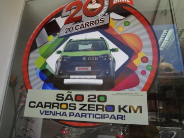 Promo&ccedil;&atilde;o 20 anos &Oacute;ticas Diniz, 20 carros zero km pra voc&ecirc;. (Imagem:FlorianoNews)
